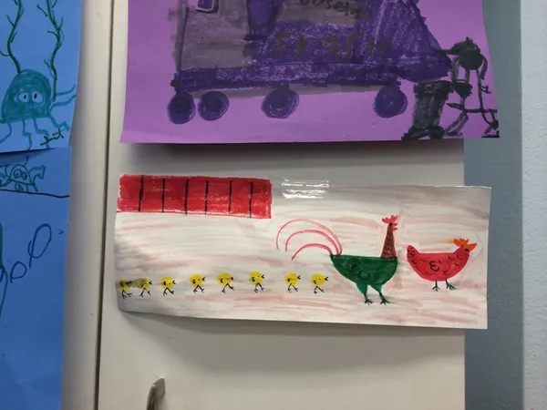 A child’s painting of a purple truck